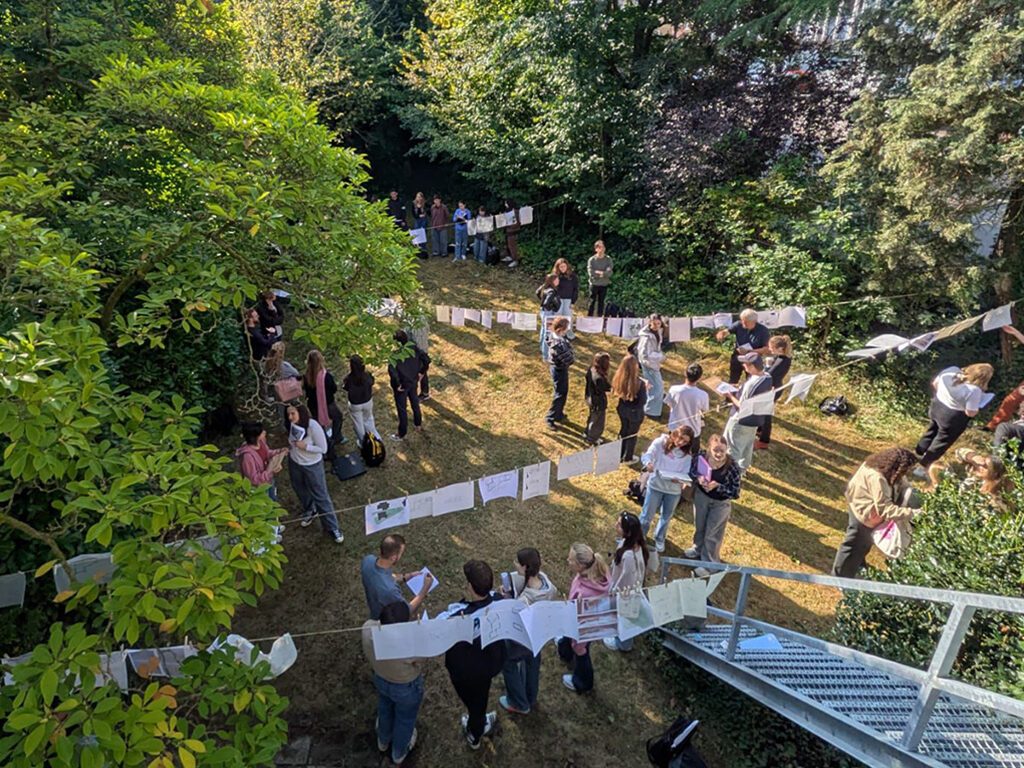 A top view of an event taking place in a big garden.