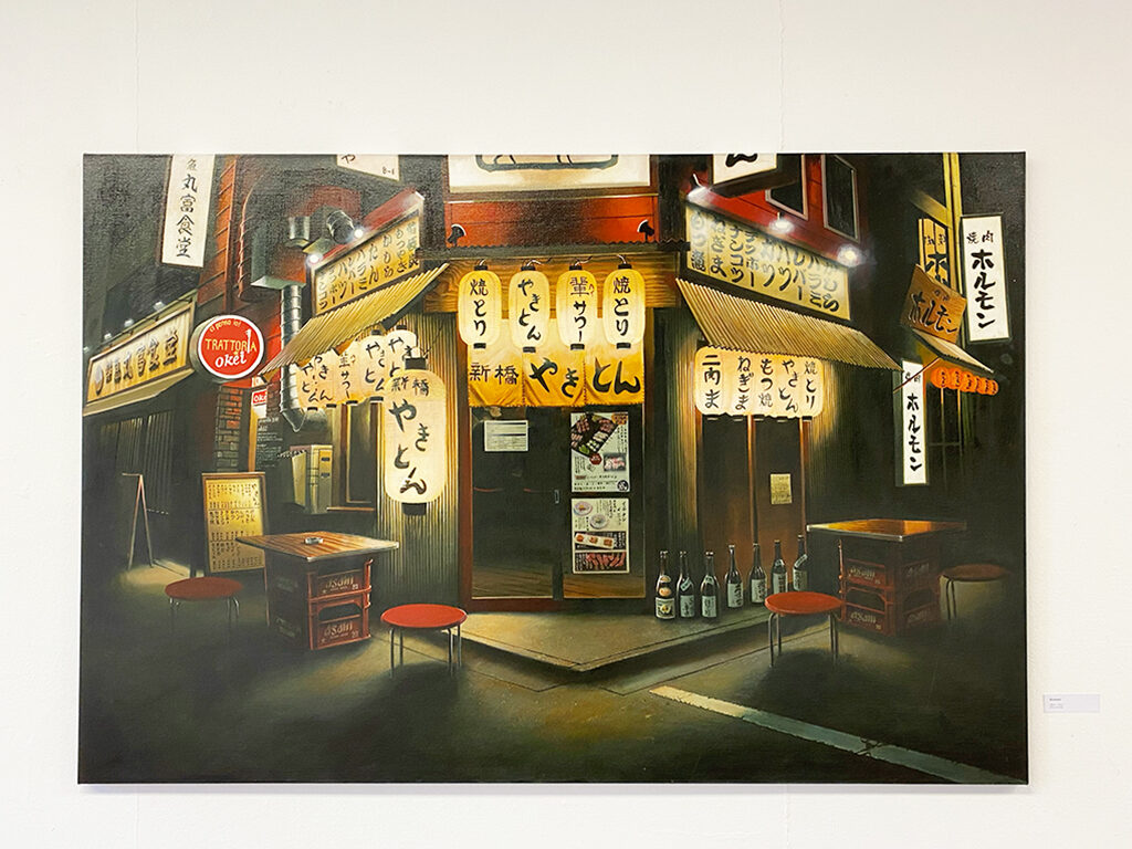 A painting from an asian building on a white wall.