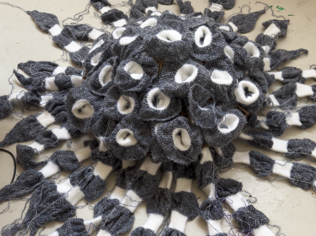 Textile pattern like installation on a white floor