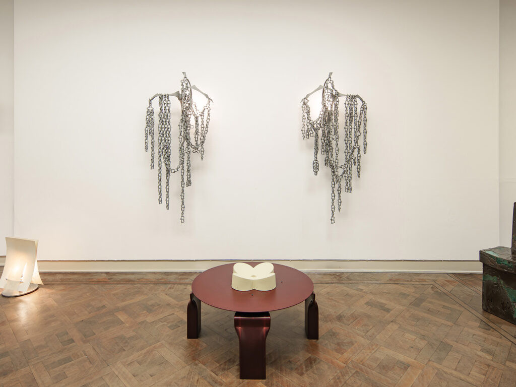 Designed set up which consisted of designed pieces some hanging from the wall, some on the floor.
