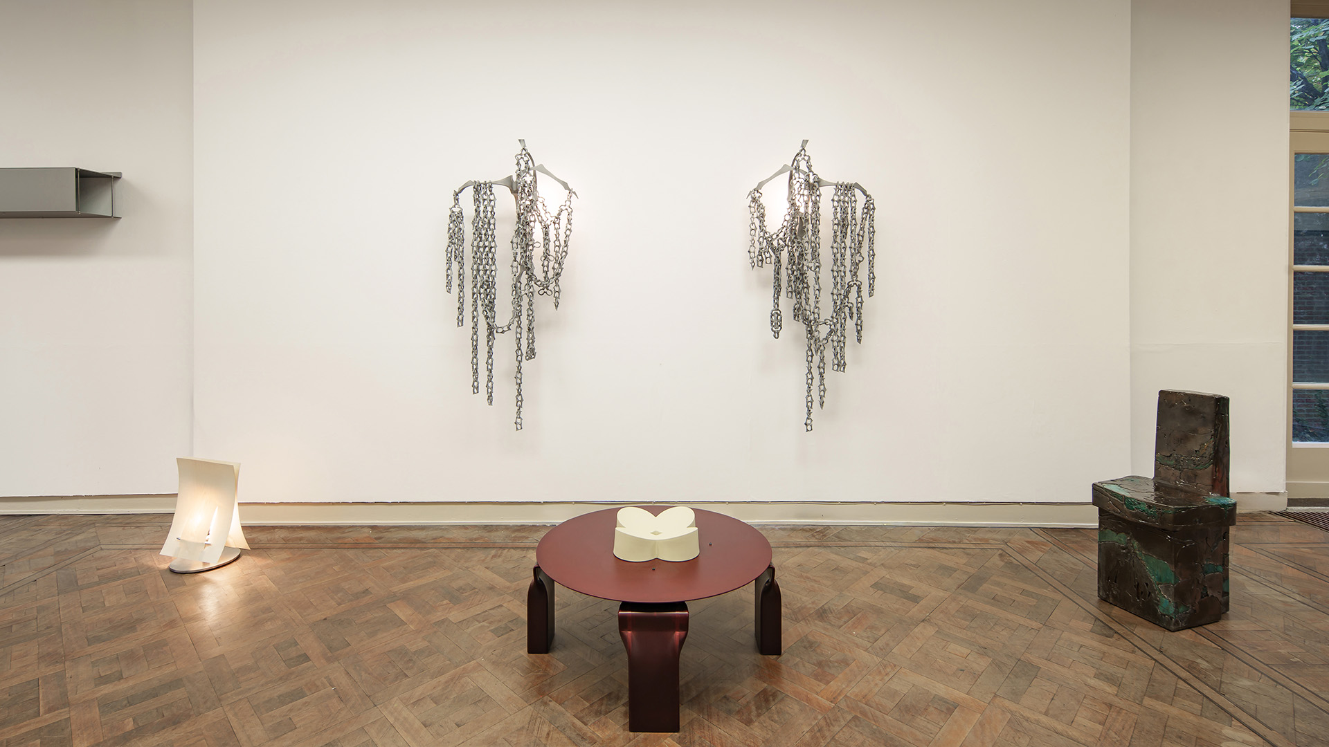 Designed set up which consisted of designed pieces some hanging from the wall, some on the floor.
